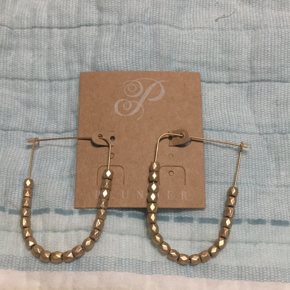 Plunder oblong, flat top hoops with beads.  Light.